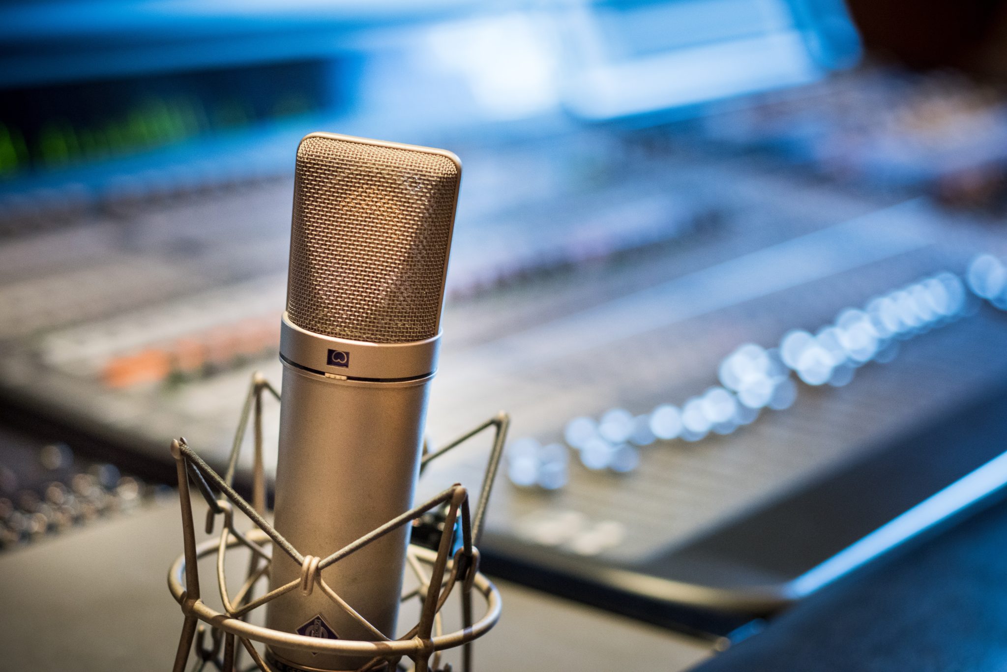 Silver microphone near audio mixer