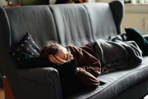 A woman lying on a couch