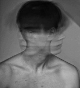 Black and white faded portrait of a person