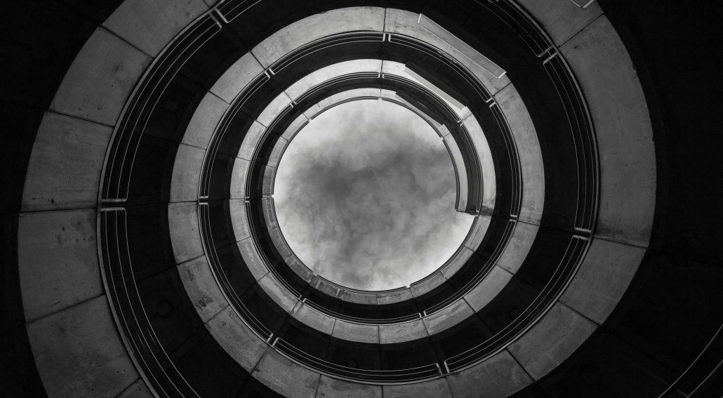 Low angle view photography of a spiral building