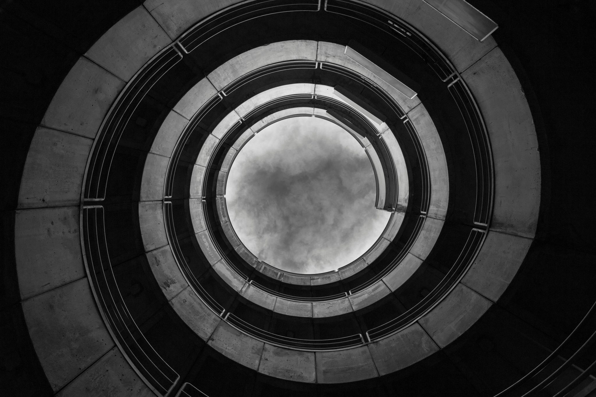 Low angle view photography of a spiral building