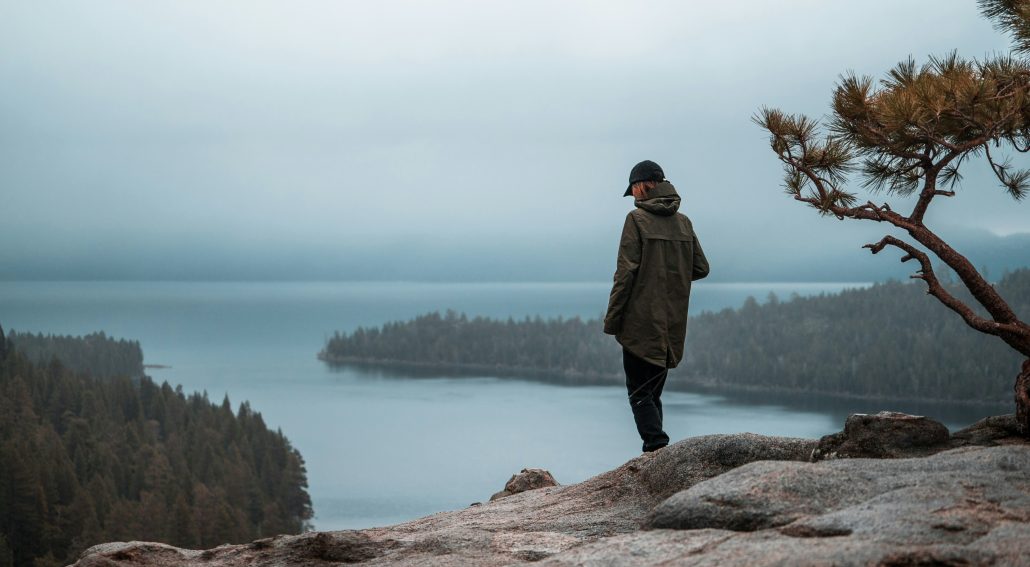 Woman standing on a cliff