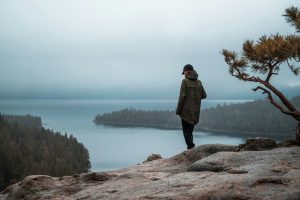 Woman standing on a cliff