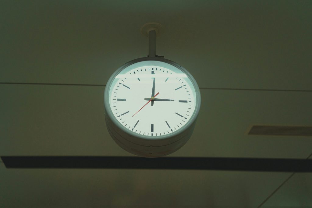Clock hanging on a ceiling