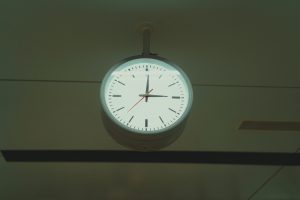 Clock hanging on a ceiling