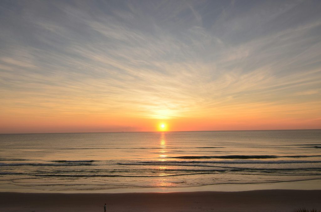 Sunrise over the ocean horizon
