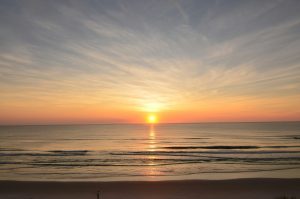 Sunrise over the ocean horizon